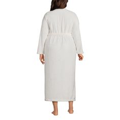 Cuddle up and unwind in this plush, luxurious robe. Made of incredibly soft fleece and in a full-length silhouette, you’ll wish you could wear it all day long and hey, maybe you should! It features an easy tie belt and two inner ties to keep it securely closed and two front pockets where you can store your cell phone or hide your favorite chocolates. For convenience we added a locker loop for hanging up when you (begrudgingly) take it off. White Cozy Sleep Robe, Winter White Sleepwear For Relaxation, White Winter Sleepwear For Relaxation, Cozy White Sleep Robe, Cozy White Robe For Relaxation, Cozy White Robe For Winter, Cozy White Winter Robe, White Winter Sleep Robe, White Long Sleeve Robe For Loungewear