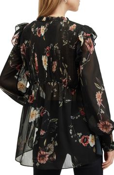 Allover blooms romance this frill-trimmed chiffon top designed with soft pleated accents. Split neck Long sleeves 100% polyester Dry clean Imported Flowy Chiffon Blouse With Floral Print, Chic Chiffon Top With Floral Print, Allsaints Long Sleeve Tops For Spring, Allsaints Fitted Tops For Spring, Spring Chiffon Blouse With Ruffle Hem, Black Floral Print Chiffon Blouse, Spring Chiffon Top With Ruffle Hem, Black Pleated Blouse For Spring, Spring Chiffon Blouse With Ruffled Collar