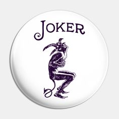 a button with the word joker on it and an image of a man holding scissors