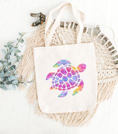 ABOUT OUR COTTON CANVAS TOTE BAG SEA TURTLE 👉 Bag Mountaineer This 100% cotton bag comes in one size - 15" x 16" - perfect for everyday wear. While the canvas material will show off your designs in great colors, it's durable and will last for years. The bag features 20" handles (made from the same canvas), making it easy to carry even with a week's worth of shopping. 🔸 100% cotton canvas 🔸 Available in natural and black colors 🔸 Heavy fabric (12 oz/yd² (406.9 g/m 🔸 Sewn-in label Gift Beach Tote Bag With Adjustable Strap, Gift Beach Tote With Adjustable Strap, Adjustable Strap Tote Beach Bag Gift, Eco-friendly Multicolor Canvas School Bag, Canvas Making, Jute Bag, Art Bag, Cloth Bag, Print Tote