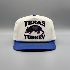 "80s/90s Retro Style Royal Blue/Natural White (W/ Light Speckles) Trucker Rope Snapback Hat w/ a Custom Vintage \"Texas Turkey Armadillo\" Print \"Texas Turkey Boy'\" * Royal Blue/Natural White * One Size Fits Most * 5-Panel Cotton Twill * High Profile, 3 ¾\" Structured Crown * Half-Moon, Retro Rope Cap * Snapback Closure **We try to provide every angle in the pictures so please read the description carefully of product listing, size, & fit description & measurements. Also please ask any questio 90s Style Adjustable Baseball Cap With Curved Brim, 90s Style Adjustable Curved Brim Baseball Cap, 90s Adjustable Snapback Hat With Curved Brim, 90s Style Adjustable Snapback Hat With Curved Brim, Topi Vintage, Style Royal, Western Hat, Western Hats, Product Listing