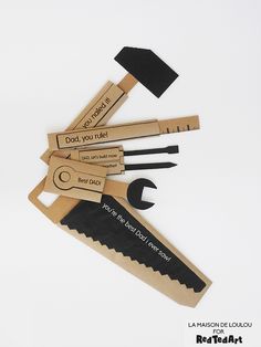 the tools are made out of cardboard and have been placed on top of each other