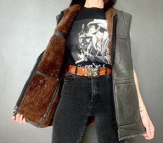 Awesome 1970s Lamb leather & shearling vest *Brown leather waistcoat with lamb fur on the inside *Thick and warm *Zipper down front *Good vintage condition. Shows normal signs of age and wear. ERA: 1970s LABEL:  SIZE: S-M. Please check measurements. Shown on a size S FABRIC: Leather & fur Measurements are taken flat and must be doubled:  Chest (closed): 54 cm x 2  Waist: 52 cm x 2 Hip: 54 cm x 2 Length: 72 cm If you have any questions regarding this item please contact the shop. Leather Waistcoat, Sherpa Vest, Shearling Vest, Vest Outfits, Halloween Shopping, Denmark, Brown Leather, 1970s, Gender Neutral