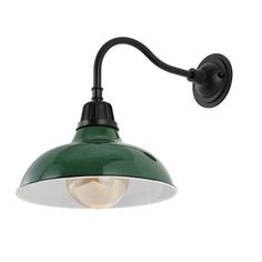 a green and white wall light with an arm extended to it's left side