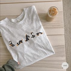 If you're a yoga or Bernese mountain dog lover, you'll love our funny dog yoga shirt! This is a must-have for any Bernese mountain dog parent. Treat yourself or surprise a friend with this thoughtful gift!  👕BELLA+CANVAS 3001 T-SHIRT Classic unisex jersey short sleeve tee made with 100% Airlume combed and ring-spun cotton, a lightweight fabric that is easy to layer, breathable. Perfect for active and leisure wear. Bella+Canvas manufactures all its products in the US and internationally in a humane, no-sweat-shop, sustainable way and is part of the Fair Labor Association as well as Platinum WRAP certified. Fabric blends: Ash and Heather Prism colors - 99% Airlume combed and ring-spun cotton, 1% polyester; Heather colors - 52% cotton, 48% polyester; Athletic Heather and Black Heather - 90% Dog Print Crew Neck Graphic Tee, Cotton Crew Neck Top With Dog Print, Relaxed Fit Short Sleeve Tops With Dog Print, Crew Neck Yoga Tops With Letter Print, Yoga Tops With Letter Print And Crew Neck, Graphic Print Crew Neck Yoga Top, Casual Yoga Tops With Letter Print, Casual Letter Print Top For Yoga, Casual Letter Print Yoga Top