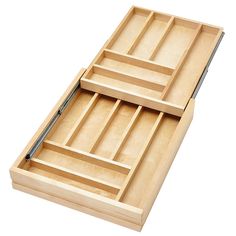 an open drawer with three compartments on each side