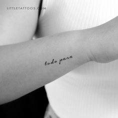 a woman with a tattoo on her arm that says, to do papaa in cursive writing