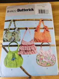 Butterick 4822 UNCUT Sewing Pattern Handbags New Pattern Pieces & Instructions 31664407386 | eBay Handbag Sewing Patterns, Crafts Sewing Patterns, Butterick Pattern, Fabric Purses, Butterick Sewing Pattern, Handbag Pattern, Precut Fabric, Handbag Patterns, Patterned Sheets