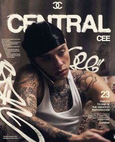 a man with tattoos on his arm sitting in front of a magazine cover that reads central cee