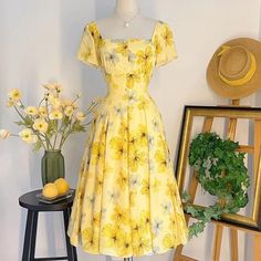 Beautiful Yellow printed dress - the same style of Mrs.Maisel  Material: Chiffon  Available size: Small: Length 102cm, Bust 84cm, Waist 64cm  Med: length 106cm, bust 88cm, Waist 68cm Large: length 108cm, Bust 92cm, Waist 72cm  XL: length 110cm, Bust 96cm , Waist 76cm **Please advise your Measurements, plus your Height and Weight, I will make sure you choose the right size.** Hello and welcome to my shop! I am new to Etsy but not to this business. All our dresses are handmade with high quality fabrics by skilled tailors. Rest assured, the dress you see in the picture is the dress that you will receive. Our dresses are priced very competitively to bring you the best value. About Size All sizes listed are external sizes of the clothing, not what your body measurement is. Measurement error of Summer A-line Printed Midi Dress, Printed Knee-length Midi Dress For Garden Party, Yellow Chiffon A-line Dress, Flowy Knee-length Printed Floral Dress, Flowy Knee-length Floral Printed Dress, Fitted Casual Chiffon Midi Dress, Casual Fitted Chiffon Midi Dress, Fitted Chiffon Midi Dress Casual, Fitted Chiffon Midi Dress Casual Style