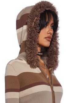 Look chic drinking that java with this cardigan that has a ribbed knit construction, a striped design, a hoodie with a fluffy faux fur trim, long sleeves with a faux fur trim, and a front zipper closure. Cozy Striped Winter Outerwear, Striped Outerwear With Ribbed Cuffs For Winter, Fitted Brown Hoodie For Winter, Fitted Brown Winter Hoodie, Trendy Brown Winter Hoodie, Striped Hooded Outerwear For Fall, Brown Knit Hoodie For Winter, Striped Knit Outerwear For Winter, Striped Fitted Cardigan For Winter