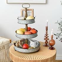 three tiered trays with food on them