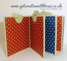 three red, white and blue bags with polka dots on them are folded in half