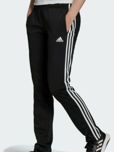 Adidas Women Ladies Essential 3 Stripes Black & White Track Pants L Large NWT The signature staple for the old-school adidas fan. These track pants rock a classic silhouette for everyday style. Throw them on before your workout for an easy warmup. A branded sign off on the left leg and iconic 3-Stripes complete the look. This product is made with Primegreen, a series of high-performance recycled materials. Climbing Stairs, Track Pants Women, Adidas Track Pants, Suit Pant, Training Pants, Adidas Sportswear, Pants Large, Adidas Sport, Stay Motivated