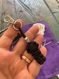 Guard your keys from evil spirits with your personalized keychain mummy. Will automatically curse anyone evil-minded who might get too close. Great as zipper pull Protects your keys Keep it on your backpack Use it as knife lanyard Black Keychain With Key Clip For Everyday Use, Black Lanyard With Key Leash For Personal Use, Black Keychain With Key Leash For Personal Use, Black Lanyard With Key Leash As Gift, Knife Lanyard, The Mummy, Color Guard, African Beads, Personalized Keychain