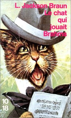 a magazine cover with a cat wearing a top hat and holding a sheet of music