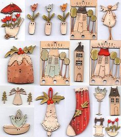 many different types of wooden magnets are shown in this photo, including houses and umbrellas