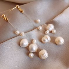 Gender : Women Pearl Type : Freshwater Pearls Shape\pattern : Geometric Style : TRENDY Material : PEARL Metals Type : Copper Brand Name : wproduby is_customized : No WHAT ABOUT REFUND?   Fast refund,100% Money Back Guarantee. If your product is defective or doesnt work properly, let us know and well send you a replacement one. We believe in our products so much that we offer a 30-day No-Hassle refund policy. If youre unhappy about your purchase, send us the product back and well refund your mone Elegant Pearl Earrings For Summer, Elegant Summer Tassel Earrings, Elegant Summer Pearl Earrings, Elegant White Pearl Earrings For Summer, Elegant Summer Earrings With Dangling Beads, Elegant Summer Tassel Drop Earrings, Elegant Tassel Drop Earrings For Summer, Elegant Long Drop Summer Jewelry, Elegant Long Drop Jewelry For Summer