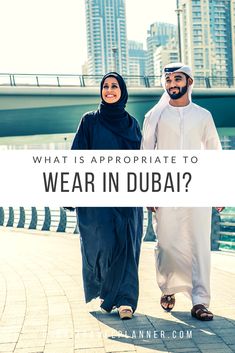 two people walking down a sidewalk with the words what's appropriate to wear in dubai?