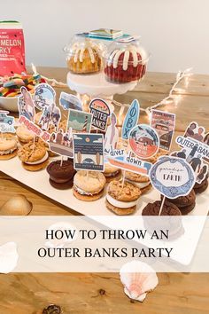 a table topped with lots of food and desserts next to a sign that says how to throw an outer banks party