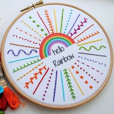 an embroidery project with the words hello rainbow on it