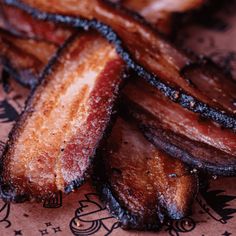 bacon strips sitting on top of a table