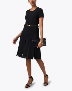 An elevated take on a little black dress, Max Mara Studio's refined style comes to life in the Papaia dress. This mini hem features sheer detailing at the chest, a pleated skirt, and a flattering belted waist. Wear this stylish piece with your favorite gold accessories, a clutch, and heels to your next cocktail event. Elegant Belted Pleated Dress For Formal Occasions, Belted Knee-length Evening Dress, Elegant Black A-line Pleated Dress, Chic Office Dress With Pleated Back, Formal Fitted Pleated Dress With Belt, Formal Fitted Belted Pleated Dress, Elegant Short Sleeve Belted Party Dress, Classic Pleated Dress For Cocktail, Elegant Fitted Belted Pleated Dress