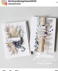 two handmade greeting cards with ribbon and embellishments, one is blue and the other is gold