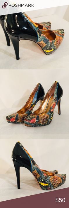 NEW BCBG Multi-Color Snake Skin Heels Pumps NEW BCBG Multi-Color Snake Skin Heels Pumps  Excellent New Condition without tags or box (NWOT). No defects. Comes from a pet free and smoke free environment.  Size: 8B Color: Black Multi-Color Heel Height: 4.5" Made In China BG-PAEYTON BGBC Shoes Heels Multicolor Synthetic Heels For Evening, Multicolor Heels With 4-inch Heel For Night Out, Multicolor 4-inch Heels For Night Out, Chic Multicolor Heels For Night Out, Snake Skin Heels, Multi Colored Heels, Heels Pumps, Made In China, Snake Skin