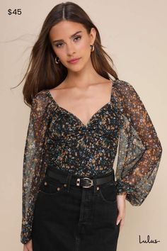 Style the Lulus Sweet Beauty Black Floral Print Knot-Front Bodysuit to create a crush-worthy OOTD! Lightweight mesh, with a ditsy floral print throughout, shapes this cute bodysuit that has a sweetheart neckline and sheer, long sleeves with elastic at the shoulders and cuffs. The fitted bodice features a trendy knotted detail at the front. Attached thong bottoms have snap closures. Fit: This garment fits true to size. Length: Size medium measures 29" from shoulder to hem. Bust: Great for any cup Mesh Long Sleeve Top Outfit, Long Sleeve Top Outfit, Mesh Long Sleeve Top, Sheer Floral Top, Black Floral Blouse, Floral Bodysuit, Lulu Fashion, Ditsy Floral Print, Mesh Bodysuit