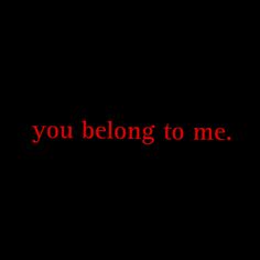 the words you belong to me written in red on a black background