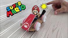 an image of a paper mario on a skateboard that is made out of cardboard