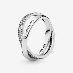 Shaped as two bands linked together as a symbol of kinship and connection, our sterling silver promise ring is set with cubic zirconia and stamped with our logo, both enduring symbols of our design and craftsmanship. An ideal gift for a special someone or a meaningful addition to your jewelry story, it looks equally cool worn stacked or solo. - Pandora FINAL SALE - Intertwined Pandora Logo and Pavé Ring - Sterling silver / Cubic Zirconia / Clear - Sz. 4.5 Pandora Logo, Pop Jewelry, Sterling Silver Promise Rings, Diy Jewelry Unique, International Jewelry, Large Jewelry, Pave Ring, Ring Pendant Necklace, Pandora Bracelets