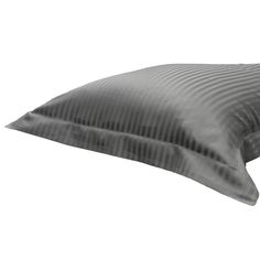 a black and white photo of a pillow on a white background with an image of a wavy pattern