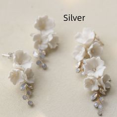 Product information : Material: ceramics Modeling: flowers Crystal type: white crystal Color: a pair of silver, a pair of gold Size Information: Length: 4-5cm Packing list: A pair of earrings White Crystal, European Style, European Fashion, Packing List, Handmade Earrings, Opal, Ceramics, Crystals, Flowers