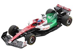 a red and green race car on a white background