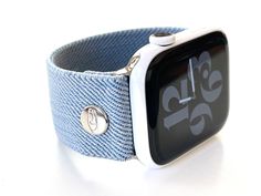 Elastic Apple Watch band - stretchy, comfortable and light! These are hand made and made to order by me in Northern California U.S. NEW Exclusive European Fabrics - Soft and durable! Light Blue Denim - perfect for a summer band Clean simple lines Hardware Free Stretch Elastic - this material is a little more structured and holds its shape beautifully and will not stretch out. Incredibly light and comfortable. Signature rivets will compliment your adapters. I'm proud of this simple design because Trendy Adjustable Blue Apple Watch Band, Casual Blue Adjustable Apple Watch Band, Casual Watch Bands Suitable For Gifts, Casual Adjustable Watch Bands As Gift, Casual Blue Apple Watch Band With Bracelet Strap, Casual Adjustable Apple Watch Band Gift, Handmade Blue Watch Bands For Everyday Use, Puffy Heart, Fabric Tape