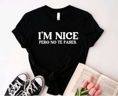 I'm Nice Pero No Te Pases Shirt, Latina shirt, Spanglish T-shirt, Mexican Shirt, Mexican American gifts, Spanish T-shirt, bebesota, badbunny Check out our instagram @PrettifyTees.Co for all the designs I've created for customers.  ❤Tshirts: All items are hand made with love. Shirts are Unisex Brand: Gildan for sweaters. Gildan or Bella Canva for shirts. Both are great and comfy! Love your item? We would love to see your photos by tagging us🤗 IG @PrettifyTees.Co ❤CARE INSTRUCTIONS -Wash inside o Mexican Shirts Sayings, Mexican Quotes, Mexican Shirt, Spanish Shirts, Mexican Shirts, American Gifts, Bible Verse Shirt, Diy Shirts, Mexican American