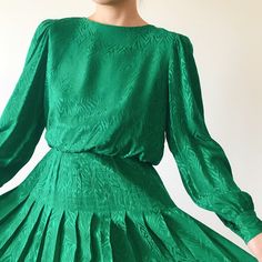 Vintage midi dress. Beautiful green color. Zipper and buttons in the back for closure. Body part is lined. Very light and comfortable, perfect for a summer day!  Excellent vintage condition Material: 100% silk label size 8, more like a modern S. Model is 5'5'', 128 lbs, usually US size 5 Flat measurements: bust: 18'' (36'' around) waist: 13-1/2'' (27'' around), model is 28'' waist, a little too tight for her.  length: 42'' Follow us on Instagram (oldgemvintage) for more choices! Please ask me about international combined shipping.  Please check the flat measurements before purchase since all sales are FINAL. Except it is mistake on my part, in which case I will refund the purchase. I do my best to examine the garments but make mistakes sometimes, please let me know if that is the case. Tha