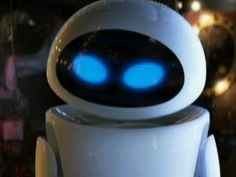 a close up of a robot with blue eyes