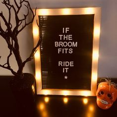 there is a sign that says if the broom fits ride it with a skull in front