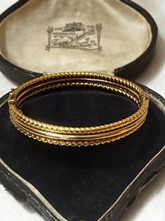 Vintage Italian 18k Gold Bangle Bracelet. The bracelet is made of a three bangles design with some textural details. It opens on the side and has a safety closure.  It is hallmarked on the back Italy 750.  The width is 0.8 mm. Weight: 12.7 grams Bracelet Length: 7.5 inch Bracelet width: 0.8 mm Excellent antique conditions. Thank you for visiting Boudoir Vintage!   Please feel free to contact me for further information or photos.  I offer international shipping. Your item will be packed with extreme care and will be shipped within 3-5 working days. If you are dissatisfied with your item, please feel free to contact me and would be happy to assist.  If you are interested in paying in installments or reserve an item, please send me an inquiry. To continue visiting my shop, please visit  https Victorian Yellow Gold Bangle Bracelet, Victorian Style Yellow Gold Bangle Bracelet, Hallmarked Yellow Gold Cuff Bangle, Antique Gold Bangle With Jubilee Bracelet, Antique Yellow Gold Bangle For Formal Occasions, Antique Yellow Gold Hallmarked Cuff Bracelet, Antique Hallmarked Yellow Gold Cuff Bracelet, Victorian Yellow Gold Hinged Bracelets, Antique Gold Jubilee Bracelet Bangle