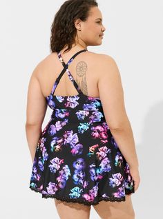 FIT Wire-free. . Lightly lined with mesh. Low coverage. Adjustable straps. . Measures 34” from shoulder. . MATERIALS + CARE Nylon-blend woven fabric. 82% nylon, 18% spandex. Machine wash cold. Line dry. Imported. DETAILS Lace trim. Modesty pads. . UPF protection: 50+ . The best plus size women's wireless mid lace trimmed swim dress with brief one-piece bathing suits in midnight roses floral deep black made of nylonspan. Fitted Tankini With Adjustable Straps For Spring, Spring Tankini With Adjustable Straps And Stretch, Fitted Spring Tankini With Adjustable Straps, Spring Fitted Tankini With Adjustable Straps, Spring Swim Dress With Adjustable Straps, Summer Swim Dress With Built-in Liner, Sleeveless Nylon Swim Dress For Spring, Adjustable Straps Sleeveless Swimwear For Spring, Spring Halter Neck Tankini With Adjustable Straps