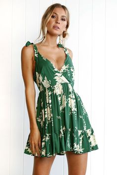 This lovely green floral dress is simply perfect. Featuring an empire waist, with a plunging v-neckline, an open back and a ruffled hem this dress pairs perfectly with wedges, heels or sandals. Made with a polyester blend for comfort and style. Modest Fashion Summer, Plus Size Fashion Summer, Casual Short Dresses, Printed Green Dress, Summer Plus Size Fashion, High Fashion Boots, Summer Beach Fashion, Long Floral Dress, Floral Dress Casual