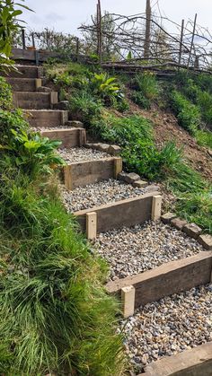 stone steps leading up to the top of a hill