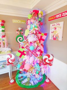 a christmas tree decorated with candy canes and candies