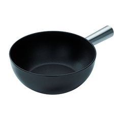 a black frying pan on a white background with a spoon in the bottom right hand corner