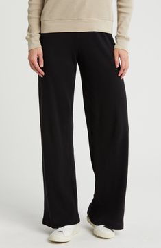 Relax in easygoing style in these soft and stretchy cotton lounge pants cut in a wide-leg silhouette. 100% cotton Machine wash, tumble dry Imported Comfort Stretch Wide Leg Lounge Pants, Wide Leg Comfort Stretch Pants For Lounging, Wide Leg Cotton Pants With Ribbed Waistband, Comfort Stretch Wide Leg Pants For Lounging, Comfortable Cotton Wide Leg Pants For Fall, Cotton Wide Leg Pants With Ribbed Waistband, Stretch Wide Leg Cotton Sweatpants, Stretch Cotton Wide Leg Sweatpants, Versatile Wide Leg Sweatpants For Everyday