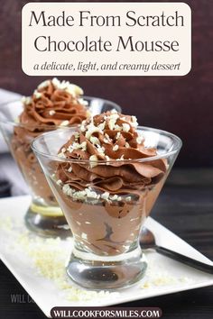 two desserts with chocolate frosting and sprinkles in glass dishes on a table