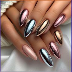 Medium almond nails with a nude or light pink base and metallic chrome tips. The chrome can be in various colors like silver, gold, or rose gold, creating a sleek and modern look. The nails are topped with a high-gloss finish to emphasize the chrome effect. Fall Nail Designs Chrome, Chrome Halloween Nails, Gel Chrome Nails, Chrome Nail Colors, Chrome Tips, Metallic Nail Art, Chrome Nail